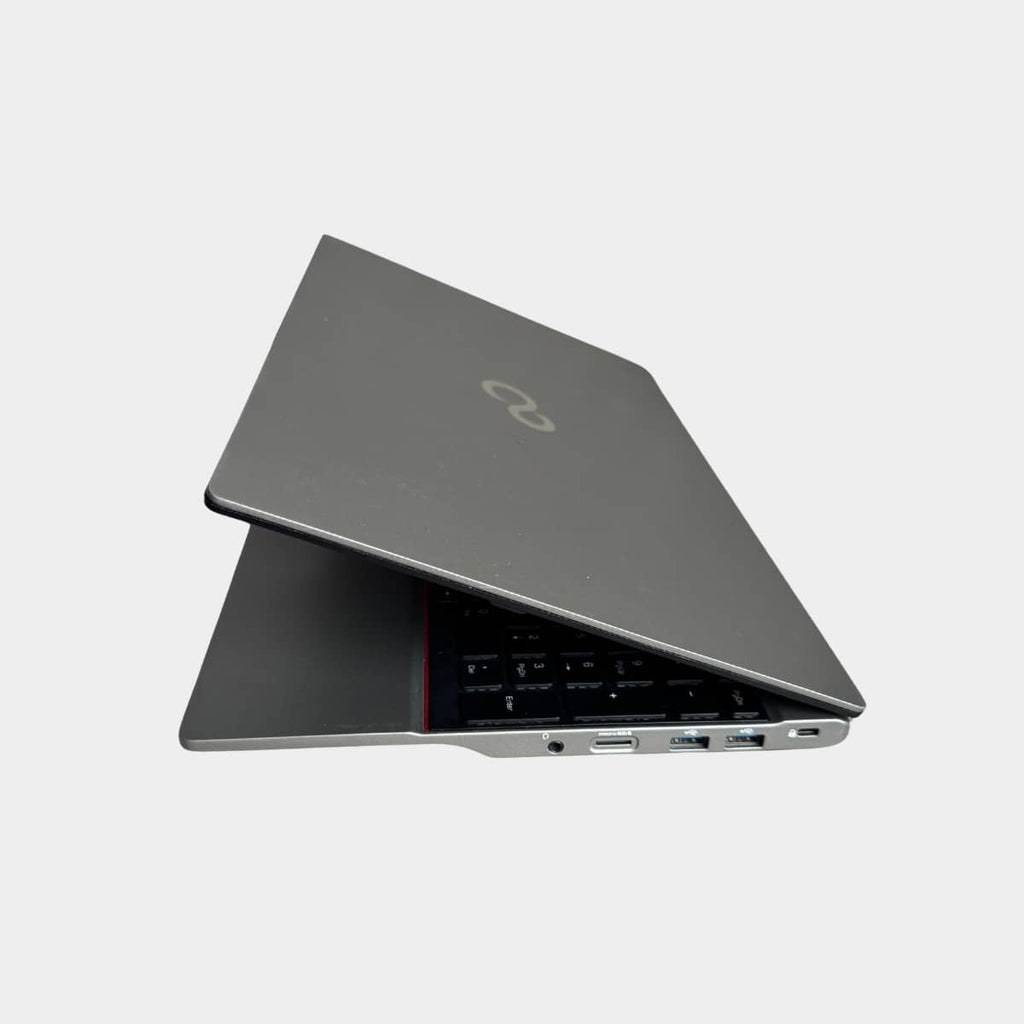 Fujitsu LifeBook U7512 pasuktas i kaire