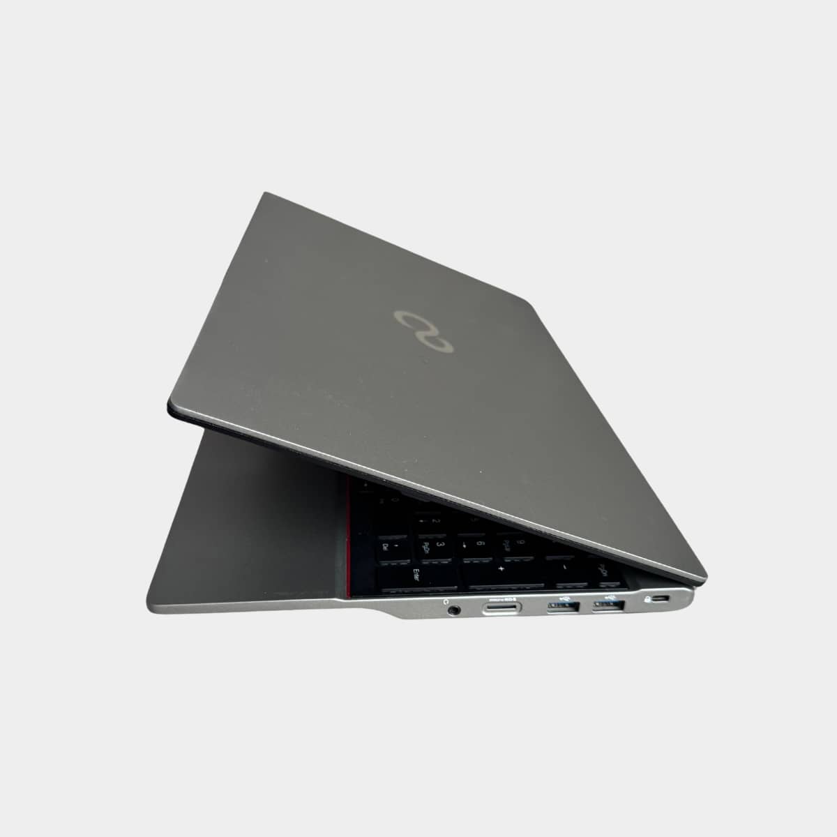 Fujitsu LifeBook U7512 pasuktas i kaire