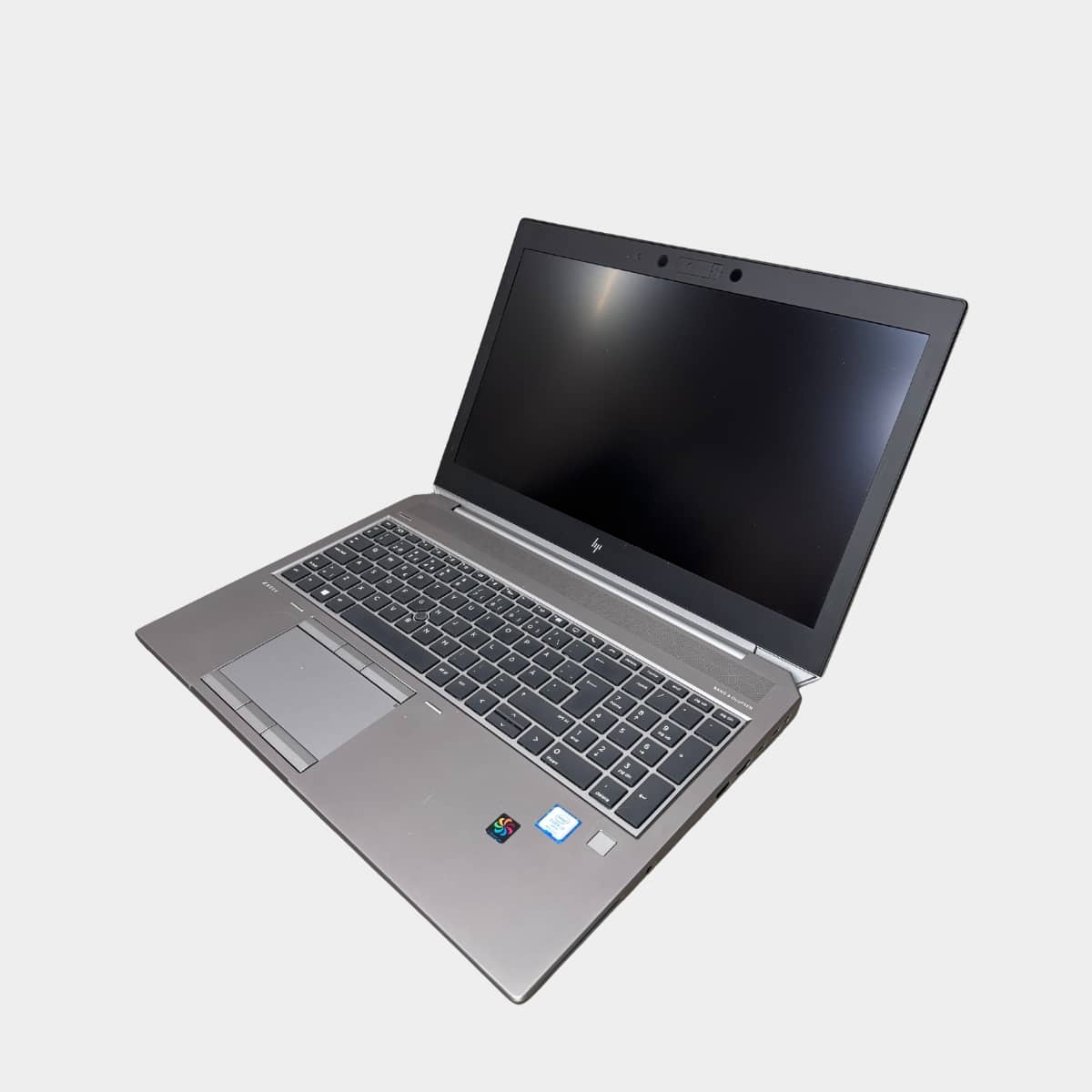 HP ZBook 15 G6 atidarytas nešiojamas kompiuteris 15.6″ su i7-9850H, 48GB RAM, 512GB SSD, Quadro T2000 pasuktas i kaire